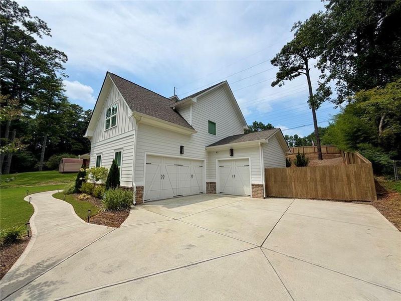Front exterior of a new home in , Marietta, GA, highlighting curb appeal (Image 26).