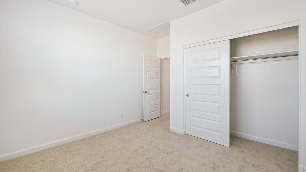 Spacious, unfurnished interior of a new home in Desert Moon Estates, Buckeye (Image 19).