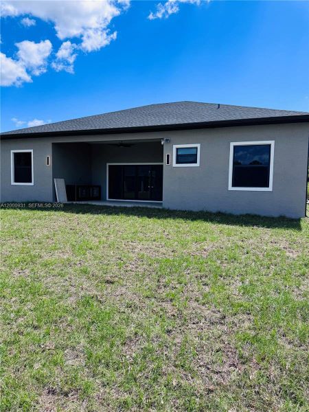 Exterior details and patio area of a home in , Port Charlotte (Image 4).