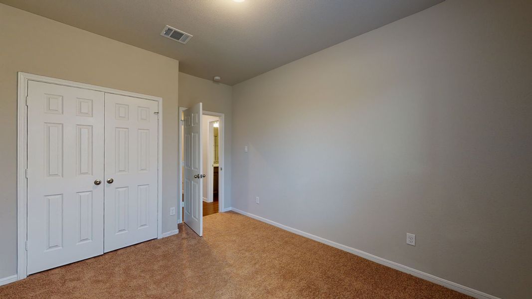 Representative unfurnished interior of a home built from the Floor Plan 3256 by Colina Homes in Grand Magnolia, Magnolia (Image 39).