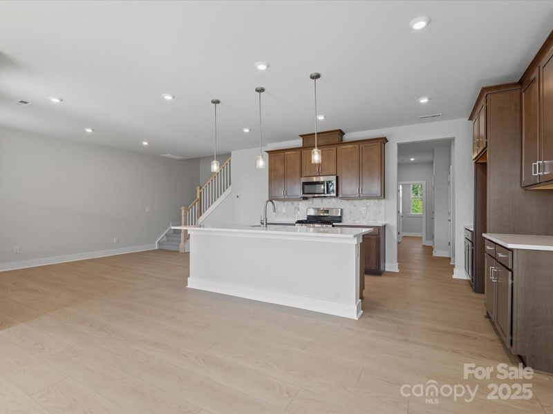 The heart of the home pulls you in.