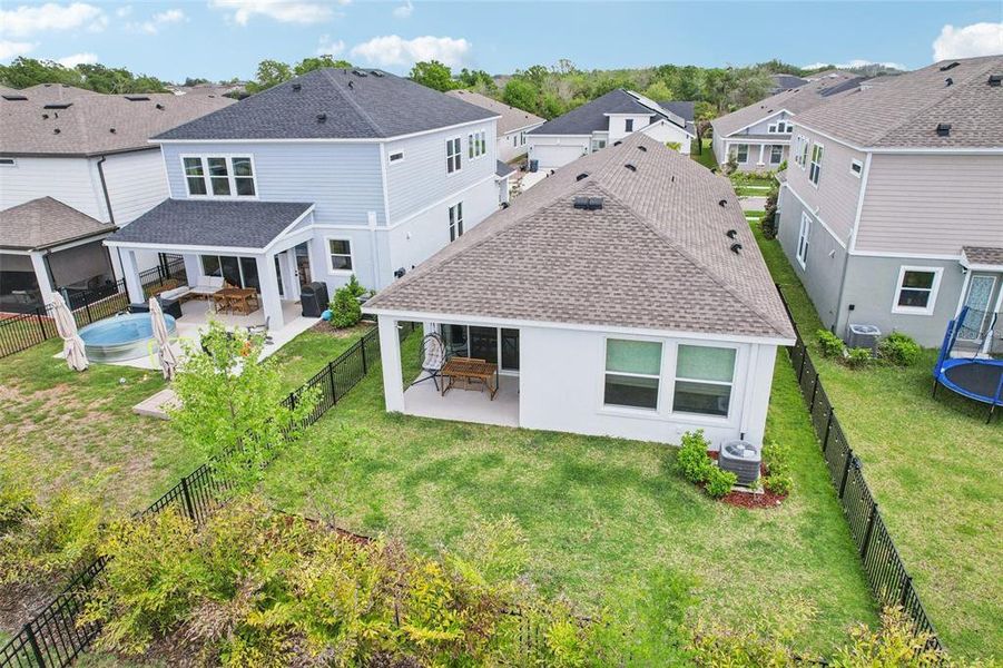 Exterior details and patio area of a home in Waterset Garden Series, Apollo Beach (Image 35).