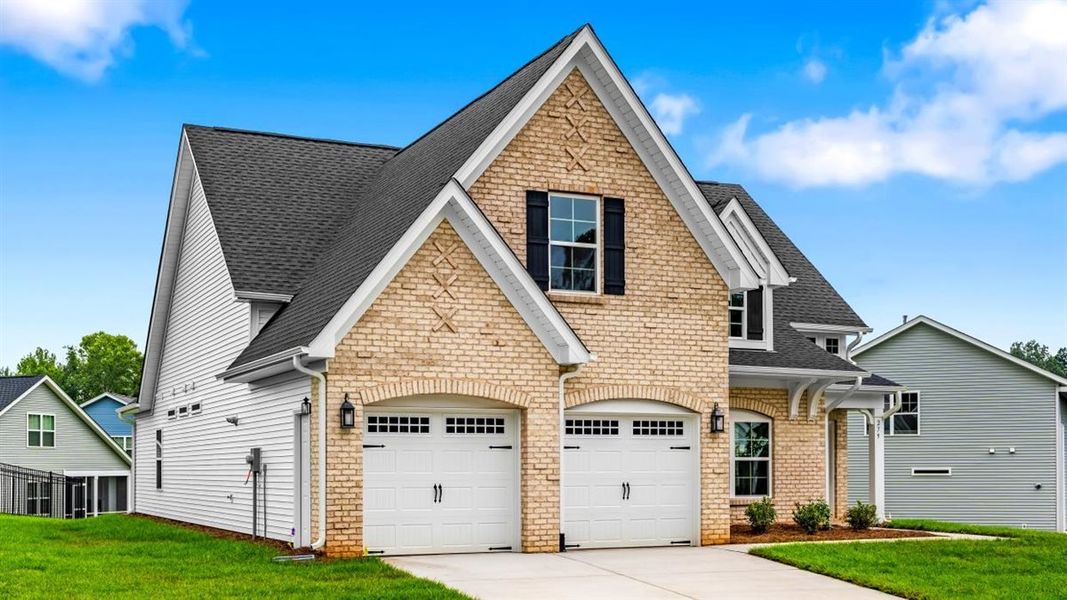 Front exterior of a new home in Brayden, Advance, NC, highlighting curb appeal (Image 22).