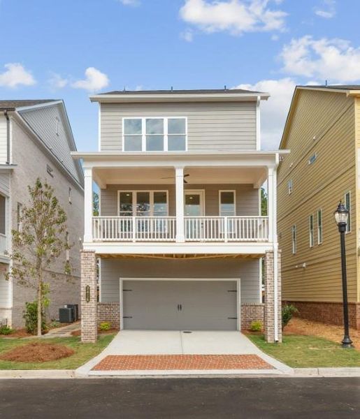 Front exterior of a new home in Archerfield, Smyrna, GA, highlighting curb appeal (Image 2). Front exterior of a new home in Archerfield, Smyrna, GA, highlighting curb appeal (Image 2).