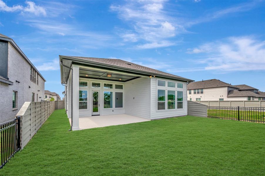 Exterior details and patio area of a home in Pomona - Reserve Collection, Manvel (Image 26).