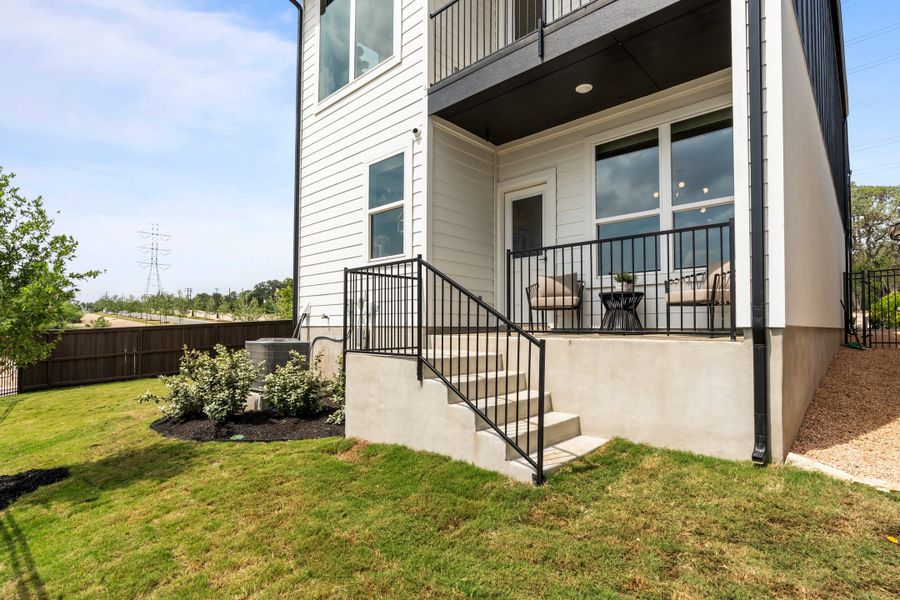Representative exterior photo of a completed home built from the Apollo by Chesmar Homes in Centero at Stone Oak, San Antonio, TX (Image 21).