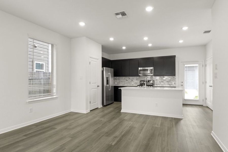 Representative furnished interior of a home built from the Elm by Pacesetter Homes in Blanco Vista, San Marcos (Image 5).