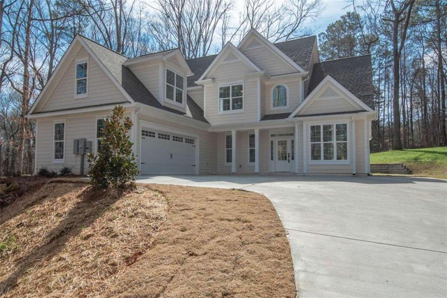 Front exterior of a new home in , Jonesboro, GA, highlighting curb appeal (Image 26).