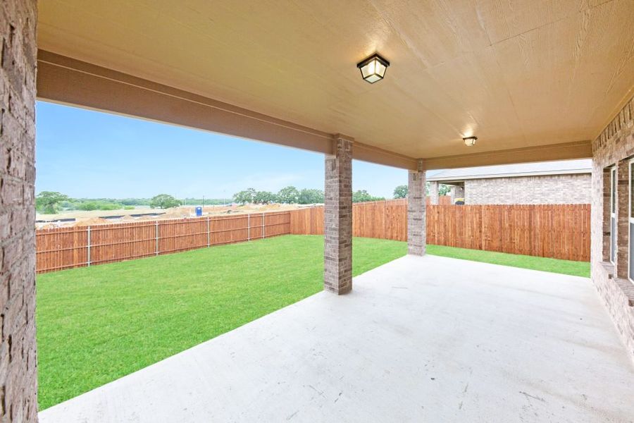 Representative exterior photo of a completed home built from the Radcliffe II by Impression Homes in Stone Eagle, Azle, TX (Image 29).
