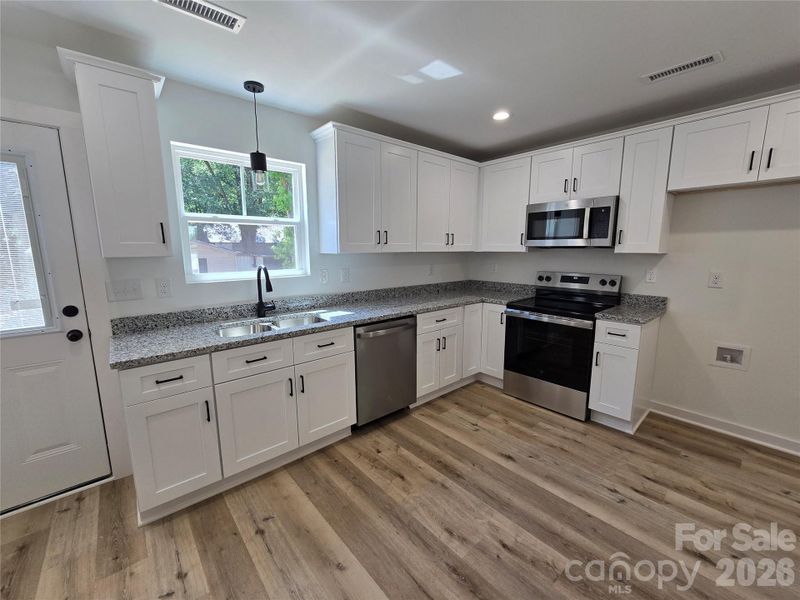 Furnished interior view inside a new home in , New London (Image 4).