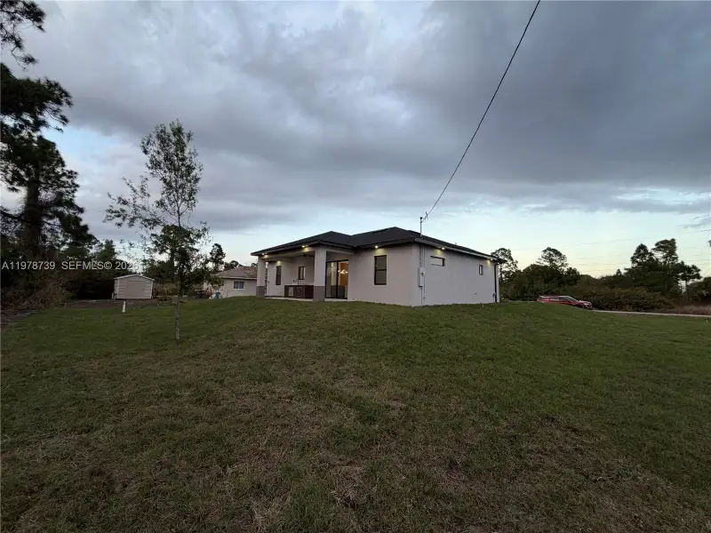 Exterior details and patio area of a home in , Lehigh Acres (Image 35).