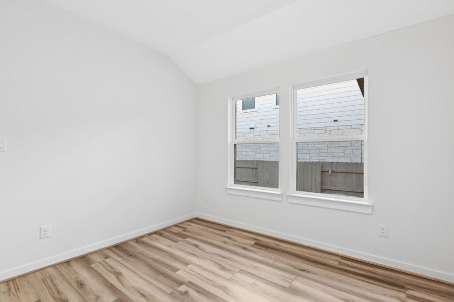 Spacious, unfurnished interior of a new home in The Colony, Bastrop (Image 18).