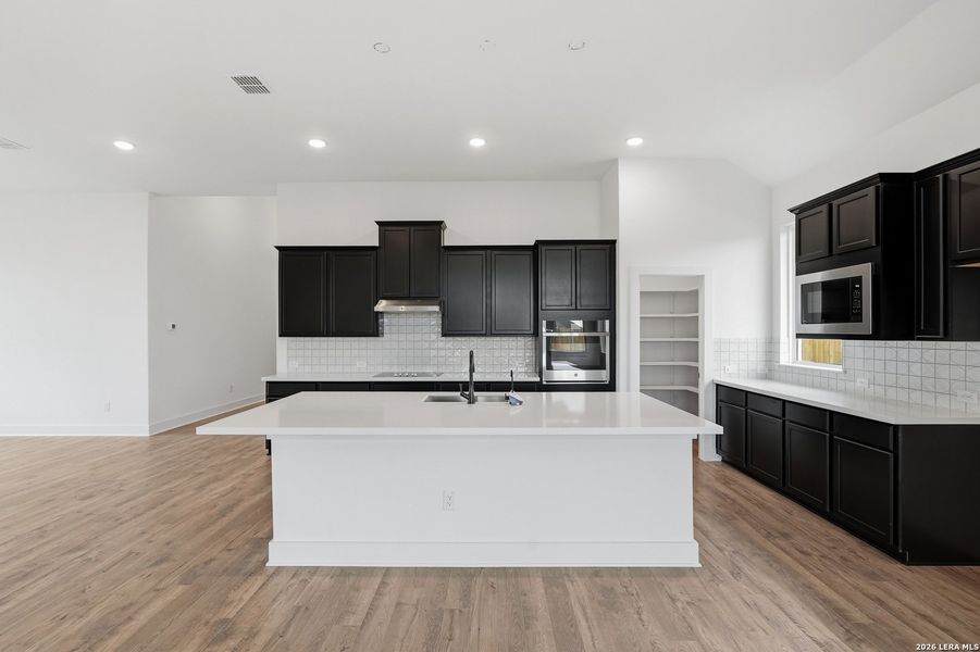 Furnished interior view inside a new home in Alsatian Oaks, Castroville (Image 18).