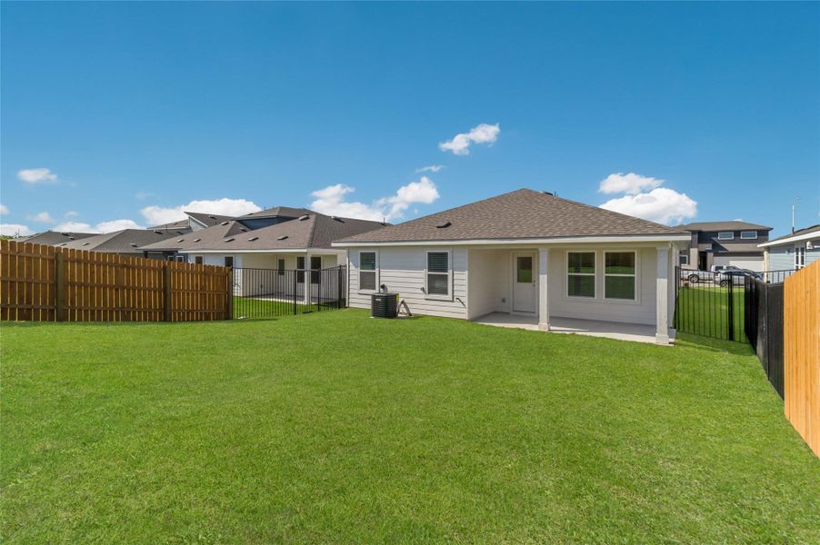 Exterior details and patio area of a home in Trails at Wildhorse, Austin (Image 17).