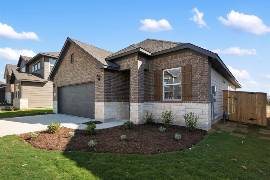 Front exterior of a new home in Patterson Ranch, Georgetown, TX, highlighting curb appeal (Image 1). Front exterior of a new home in Patterson Ranch, Georgetown, TX, highlighting curb appeal (Image 1).