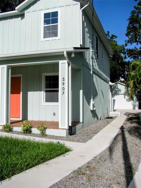 Front exterior of a new home in , Tampa, FL, highlighting curb appeal (Image 2).