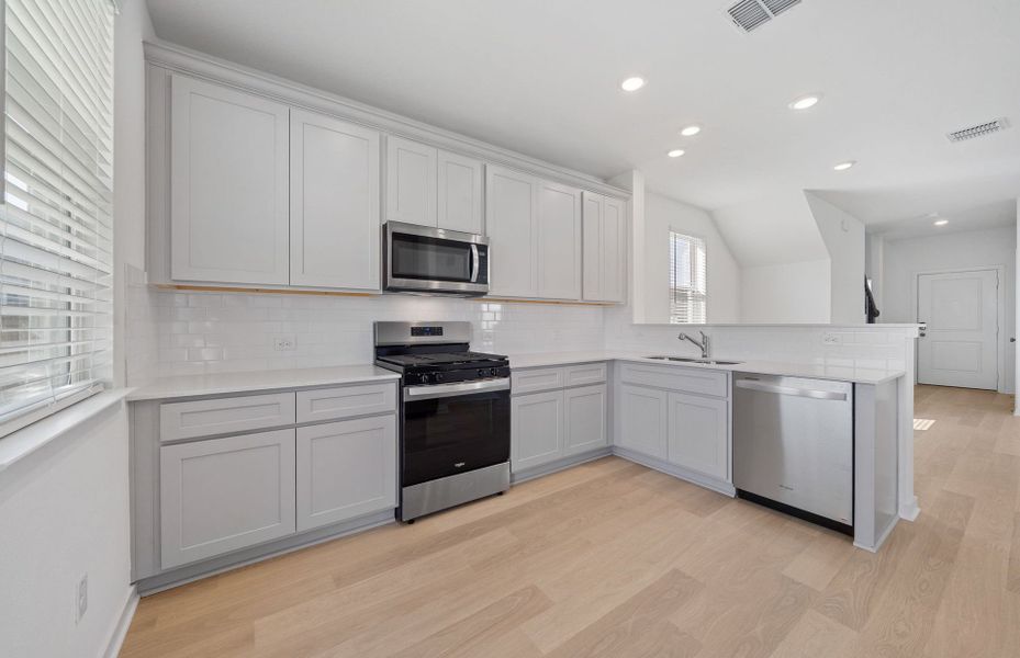 Furnished interior view inside a new home in Sunfield, Buda (Image 7).