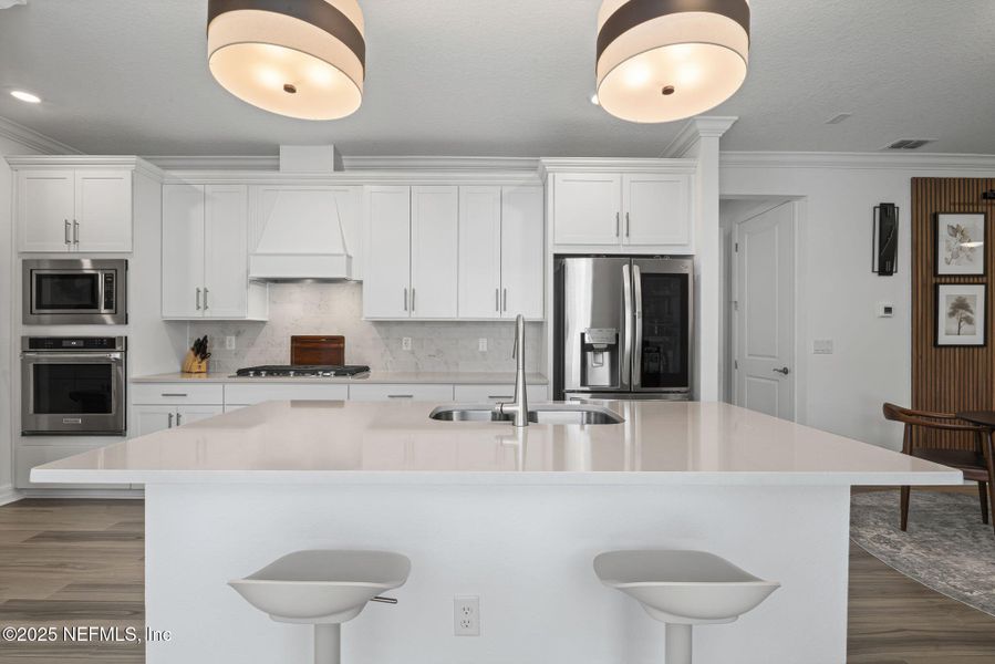 Furnished interior view inside a new home in Summer Bay at Grand Oaks, St. Augustine (Image 5). Furnished interior view inside a new home in Summer Bay at Grand Oaks, St. Augustine (Image 5).