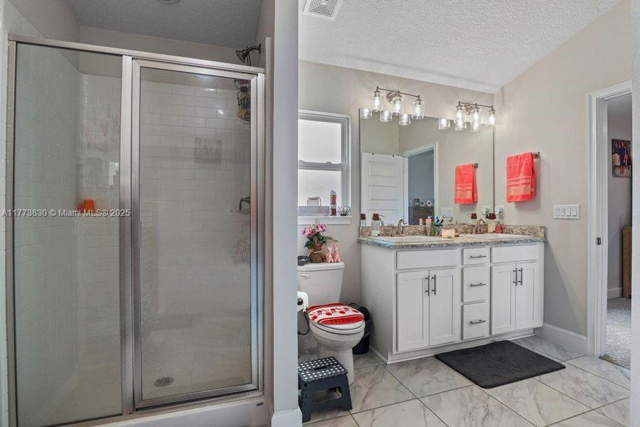 Furnished interior view inside a new home in Waterstone 62, Fort Pierce (Image 5).