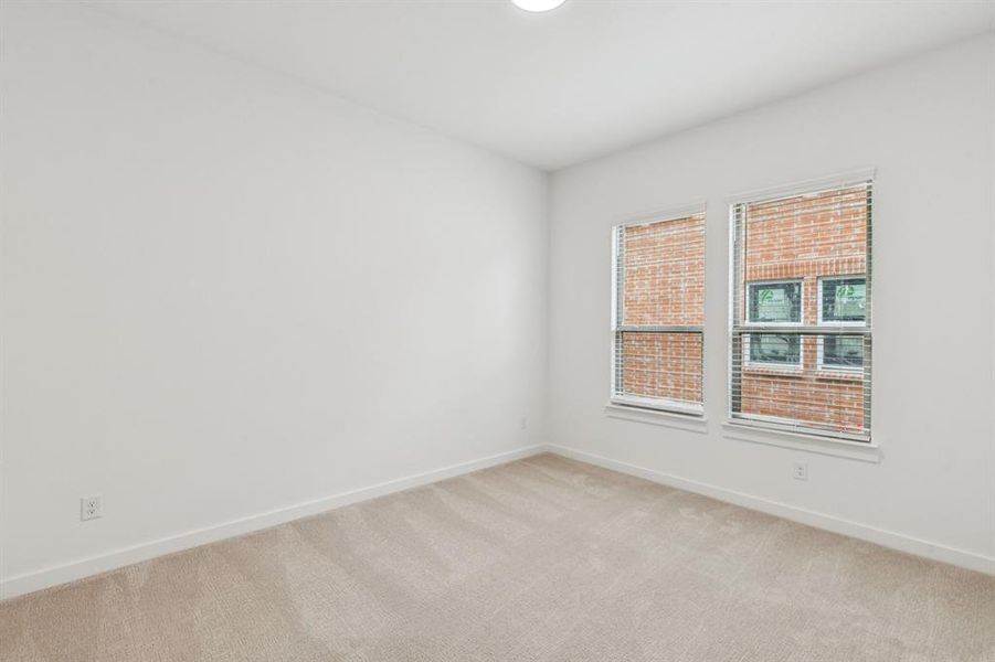 Bedroom in the Da Vinci II home plan by Trophy Signature Homes – REPRESENTATIVE PHOTO