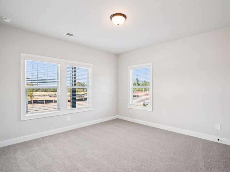 Spacious, unfurnished interior of a new home in Hemingway - Highland Series, Cumming (Image 18).