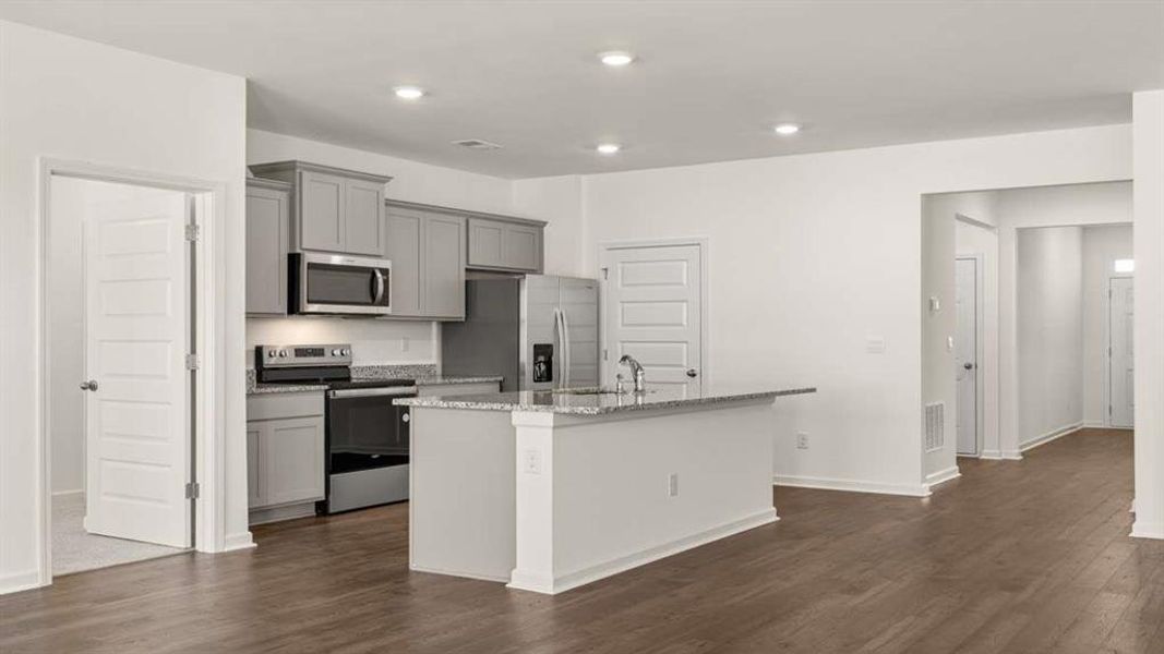 Furnished interior view inside a new home in Champion's Run, Lithonia (Image 9).