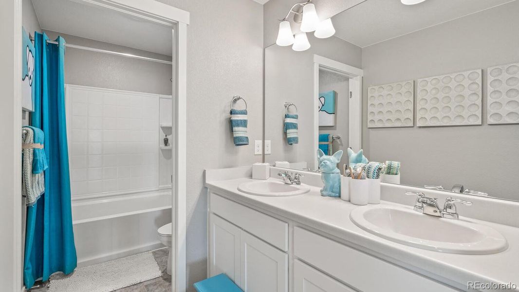 Furnished interior view inside a new home in Trails at Crowfoot, Parker (Image 8).