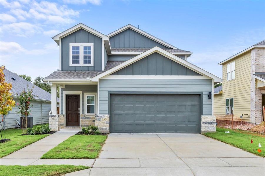 Front exterior of a new home in Ambergrove, Royse City, TX, highlighting curb appeal (Image 1). Front exterior of a new home in Ambergrove, Royse City, TX, highlighting curb appeal (Image 1).