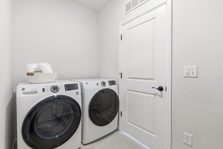 Representative furnished interior of a home built from the 4904 by Risewell Homes in The Aurora Highlands, Aurora (Image 23).