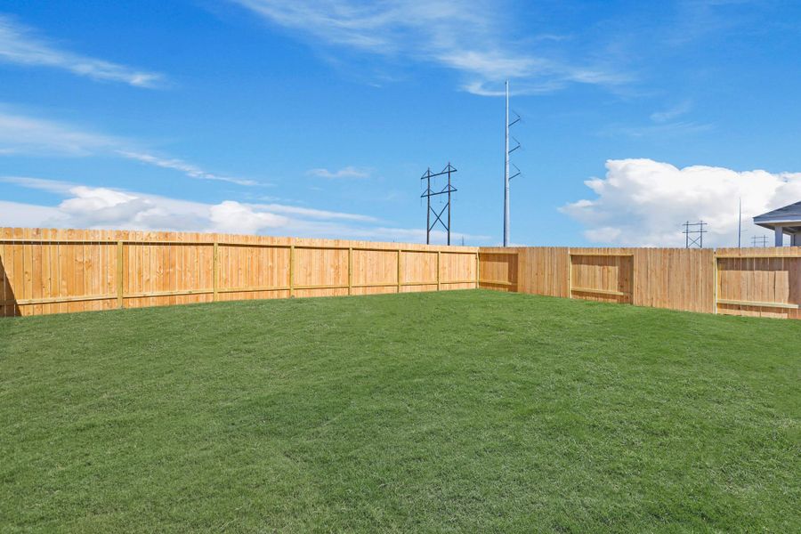 Exterior details and patio area of a home in Porters Mill, New Caney (Image 3).
