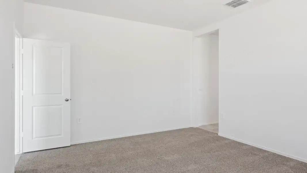 Spacious, unfurnished interior of a new home in Heartland Ranch, Coolidge (Image 15).