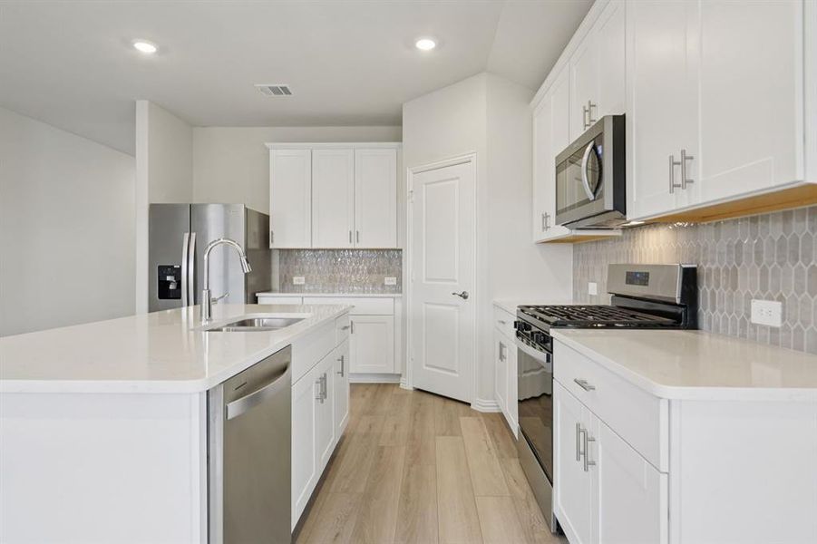 Furnished interior view inside a new home in Parks at Foster Crossing - Premier Series, Anna (Image 8). Furnished interior view inside a new home in Parks at Foster Crossing - Premier Series, Anna (Image 8).