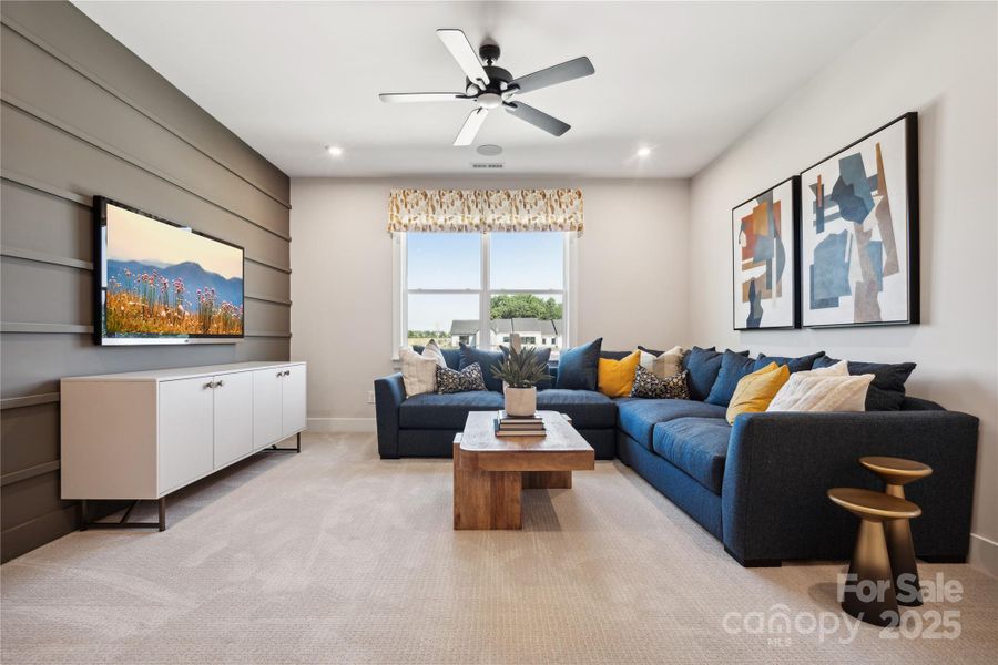 This lounge space will be your new favorite movie night spot. *Model Photos | actual finishes, structural selections, and orientation may vary.