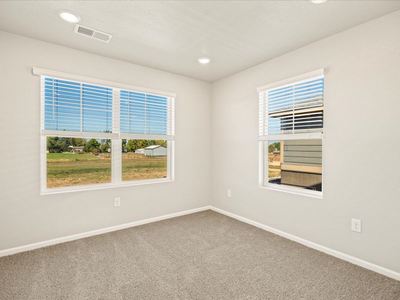 The Breckenridge floorplan interior image taken at a Meritage Homes community in Berthoud, CO.