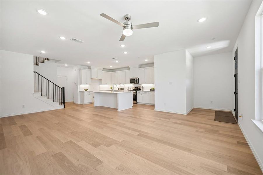 Featuring an open concept floor plan designed with entertaining in mind, you will love this beautiful home!