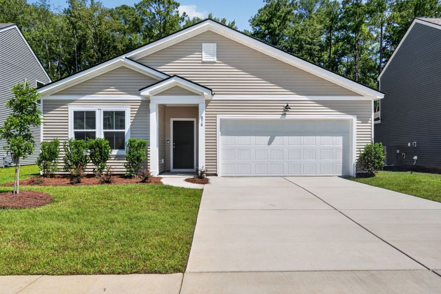 Front exterior of a new home in Bradford Pointe, Summerville, SC, highlighting curb appeal (Image 18).