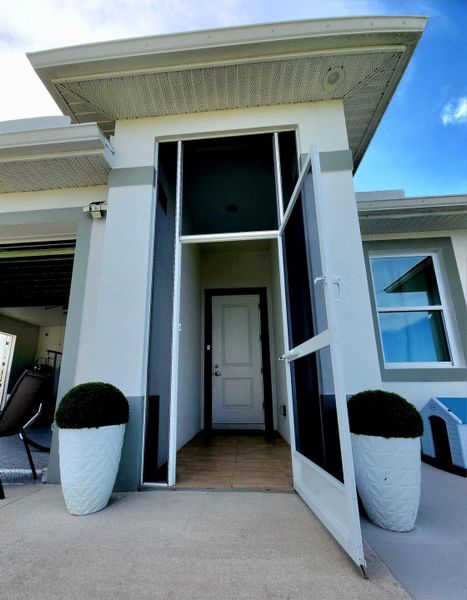 Exterior details and patio area of a home in , Labelle (Image 24).