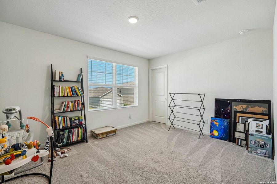Furnished interior view inside a new home in Hennersby Hollow, San Antonio (Image 16).