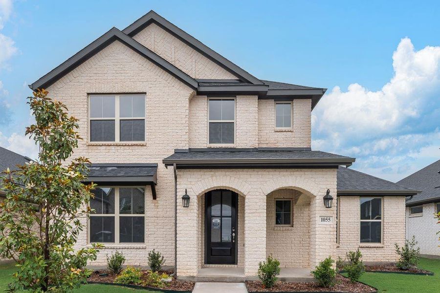 Front exterior of a new home in Bridges at Preston Crossings, Gunter, TX, highlighting curb appeal (Image 1). Front exterior of a new home in Bridges at Preston Crossings, Gunter, TX, highlighting curb appeal (Image 1).