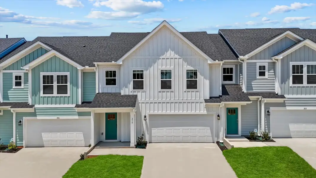 Front exterior of a new home in Village at Midway, Anderson, SC, highlighting curb appeal (Image 21).