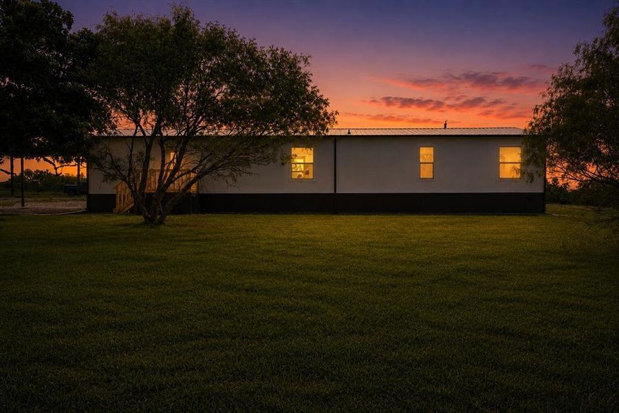Exterior details and patio area of a home in , Poolville (Image 25).