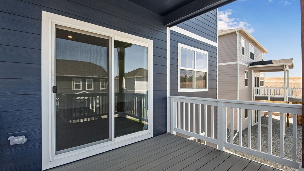 Exterior details and patio area of a home in Trails at Crowfoot, Parker (Image 26).