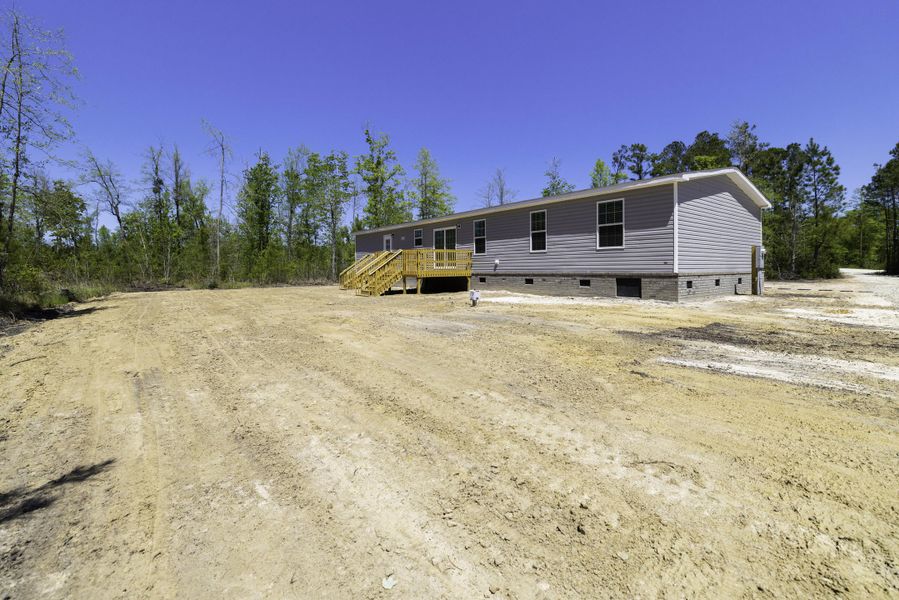 Exterior details and patio area of a home in , Cross (Image 32). Exterior details and patio area of a home in , Cross (Image 32).