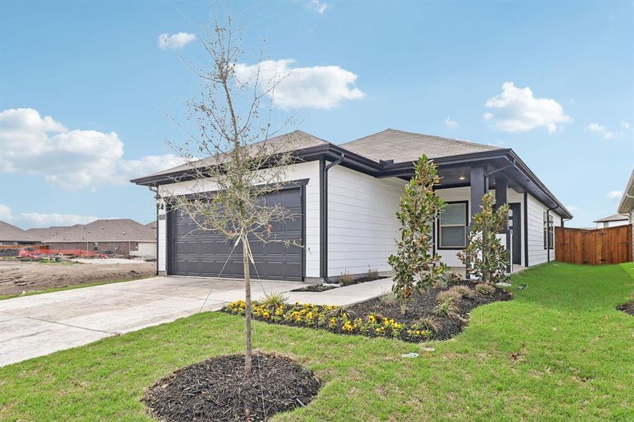 Front exterior of a new home in Lakehaven - Spring Series, Farmersville, TX, highlighting curb appeal (Image 19).