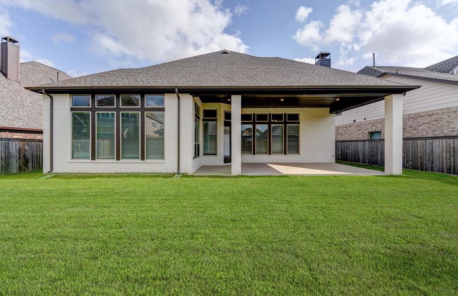 Exterior details and patio area of a home in Bridgeland 60′, Cypress (Image 1). Exterior details and patio area of a home in Bridgeland 60′, Cypress (Image 1).