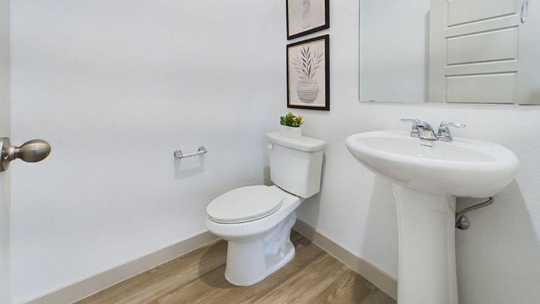 Representative furnished interior of a home built from the The Pierce by D.R. Horton in Overlook West, Wolfforth (Image 14).