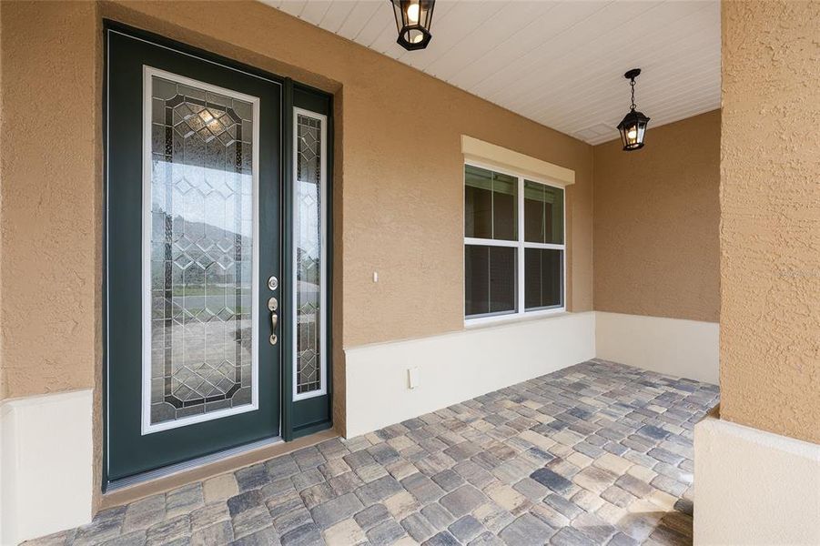 Exterior details and patio area of a home in On Top of the World Communities, Ocala (Image 17).