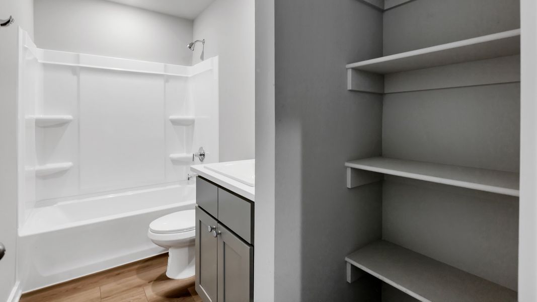 Representative furnished interior of a home built from the The Bentworth by D.R. Horton in Viridian, Lubbock (Image 9).