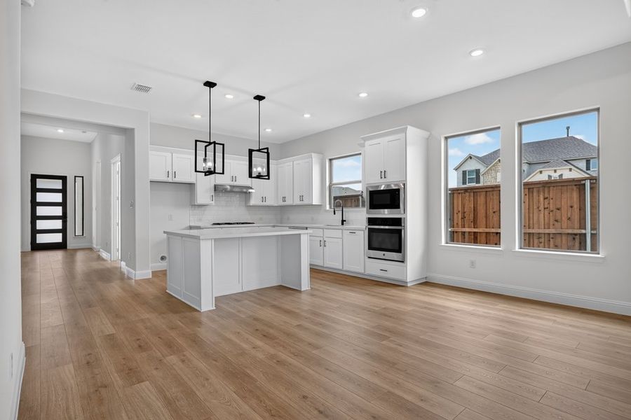 Furnished interior view inside a new home in Highland Lakes, McKinney (Image 9).