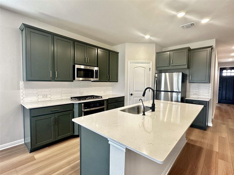 Furnished interior view inside a new home in The Colony 50s, Bastrop (Image 7).